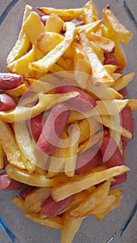 Plate with fries and sausages photo