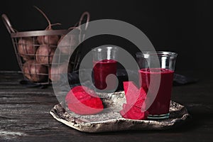 Plate with glass of beet smoothie