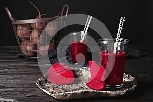 Plate with glass of beet smoothie