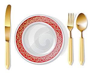 Plate, golden spoon, fork and knife