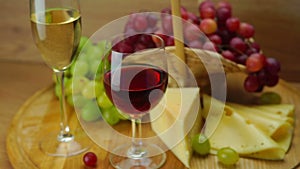 Plate with Grapes, Cheese and Glasses of Wine.