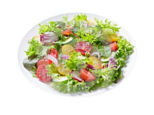 plate of green salad with fresh vegetables on white background