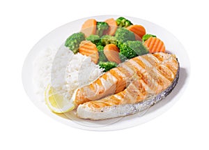 plate of grilled salmon, rice and vegetables on white background