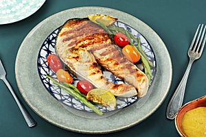 Plate of grilled salmon steak