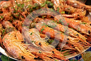 Plate of grilled shrimps in Ballaro market