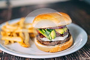 A plate of hamburger and fries