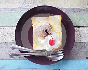 Plate of honey toast with chocolate ice-cream