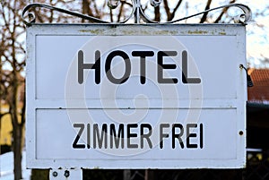 Plate of a hotel labelled Vacancies