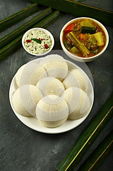 Plate of idly sambar and chutney