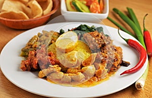 Plate of indonesian food photo