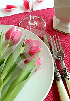 Plate, knife, fork and tulips