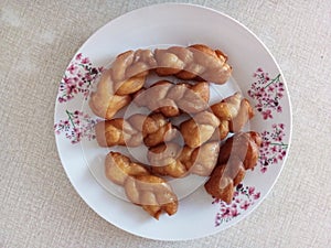 A Plate Of Koeksister Pastries