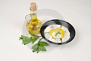 A plate of Labneh covered with olive oil breakfast dish