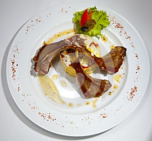 Plate of lamb chops on a mash