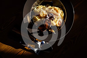 Plate of linguine pasta with fresh oyster mushroom cream sauce