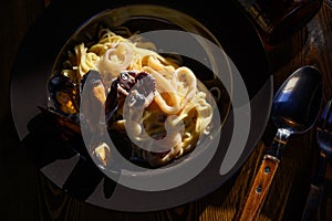 Plate of linguine pasta with fresh oyster mushroom cream sauce