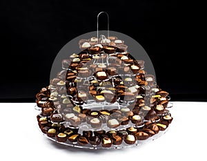 Plate with lot of Belgian chocolate pralines ready for eating