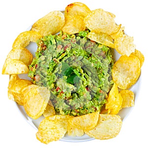 Plate of mexican chips with guacamole and glass beer closeup