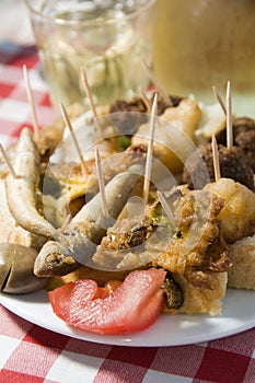 Plate of mezes appetizers wine Greek food