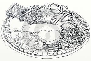 A plate with mixed biscuits, ideal for tea