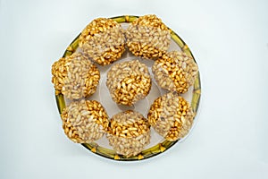 A plate of Murmura Murai Ladoo Puffed Rice in Jaggery Balls Maghe Makar Sankranti Festival