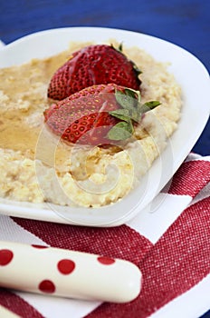 Plate of nutritious and healthy cooked breakfast oats