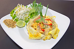 Plate of Pad Thai or phat Thai in omelette