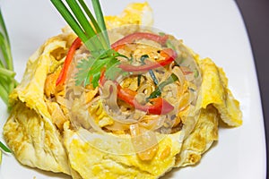 Plate of Pad Thai or phat Thai in omelette