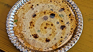 A plate of paratha served in a restaurant in Mussoorie