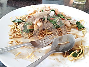 Plate of partially eaten food photo