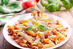 Plate of penne pasta bolognese