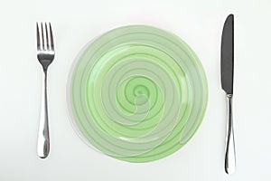 Plate with a picture of flowers and a knife with a fork