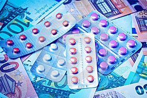 Plate with pills on the background of euro bills. The concept of the expensive cost of healthcare