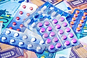 Plate with pills on the background of euro bills. The concept of the expensive cost of healthcare