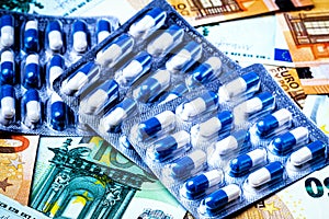Plate with pills on the background of euro bills. The concept of the expensive cost of healthcare