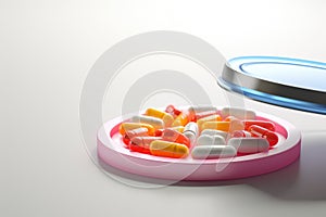 Plate of Pills Next to Magnifying Glass for Examination, Stethoscope with pile of colorful antibiotic capsule pills on white table