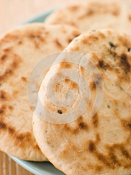 Plate of Plain Naan Breads photo