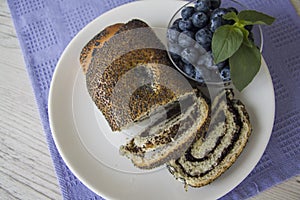 Plate of poppy strudel and blueberry