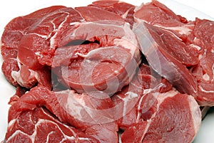 A plate of raw stewing steak