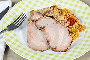 Rice, niÃÂ§oise ratatouille and roast pork photo