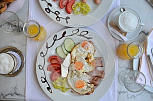 Plate with rich breakfast