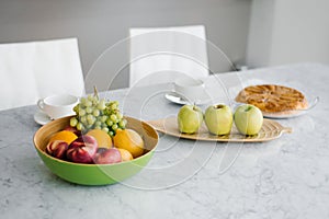 Plate of ripe fruits on a table