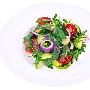 Plate with salad of fresh vegetables with avocado, isolated on white background