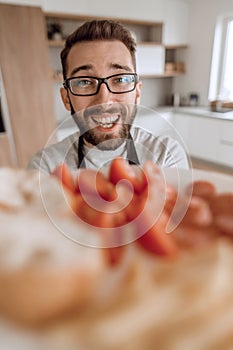 Plate of sandwiches in the hands of an attractive man