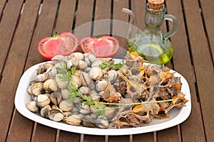 Plate of sea snails and fresh cockles