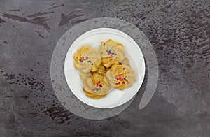 Plate of shortbread cookies on a gray background