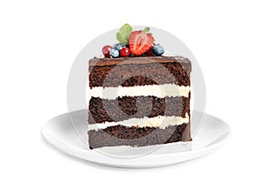 Plate with slice of chocolate sponge berry cake