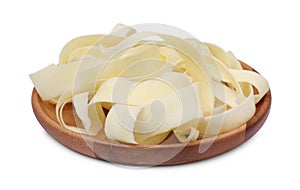 Plate with sliced fresh parsnip on white background