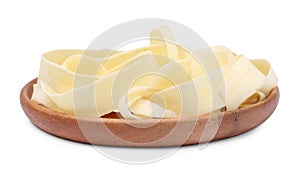 Plate with sliced fresh parsnip on white background