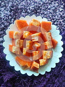 A Plate Of Sliced Papaya High Angle Shot